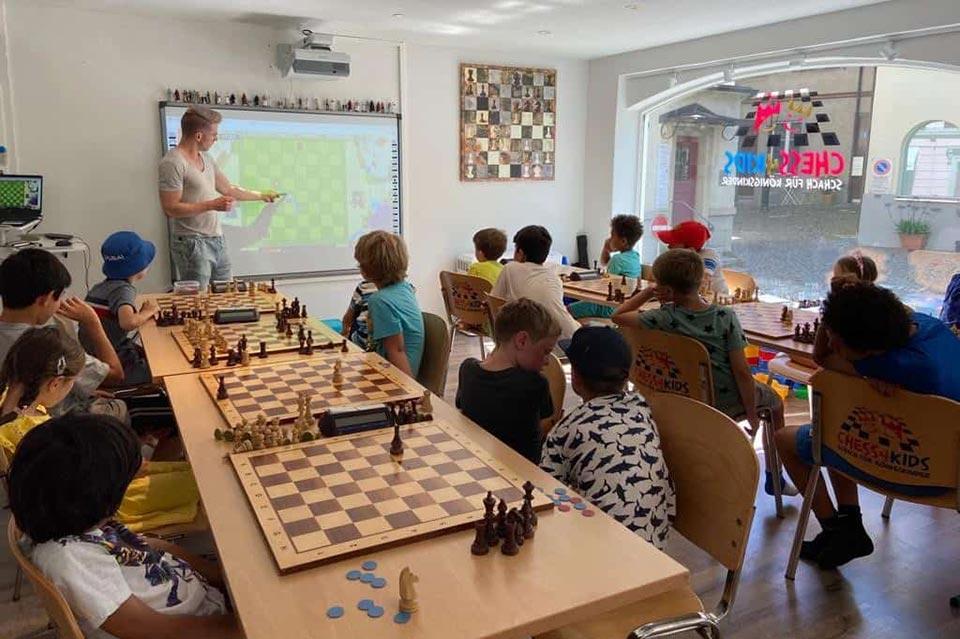 Children attending a chess lesson