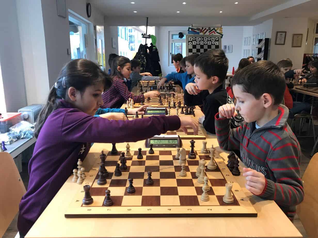 Boy and girl playing Blitz chess