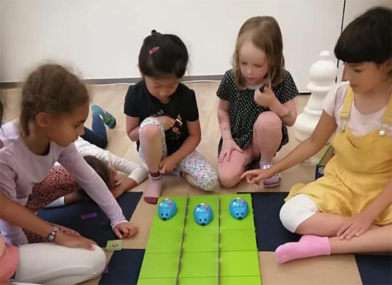 Children play mouse races